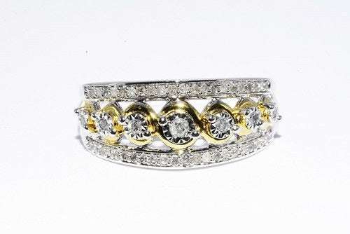 A Two-Tone Silver and Gold Row Ring with Diamonds